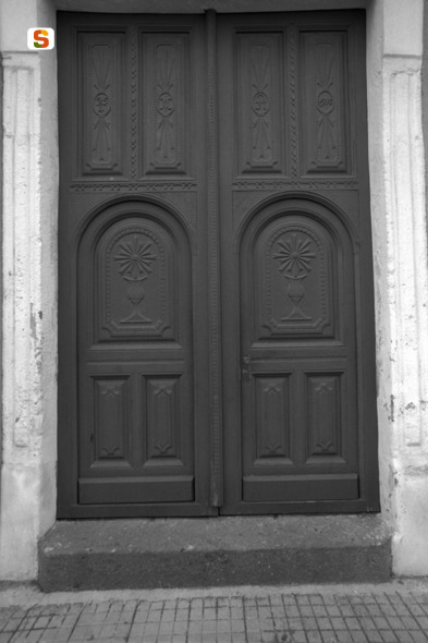 calice eucaristico// ostia raggiata (portone) (sec. XX)