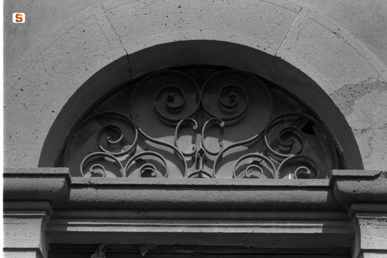 motivo decorativo a volute (sovrapporta) (sec. XIX)
