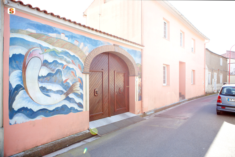 paesaggio con architetture, figure umane e animali (murale) di Meo Enrico (sec. XXI)