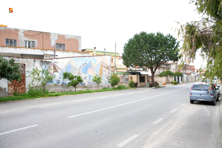 paesaggio con architetture (murale) di Sciola Pinuccio (sec. XX)